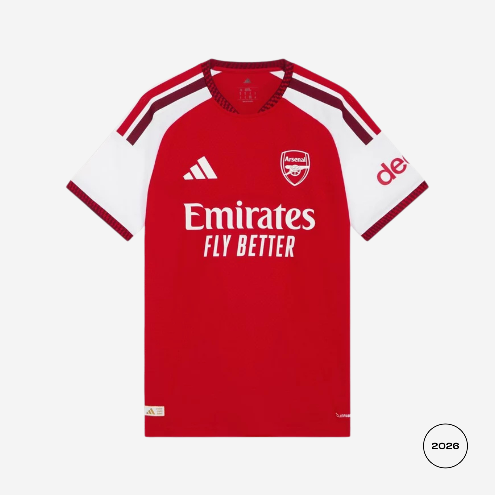 Red sports jersey with Emirates logo on a white background