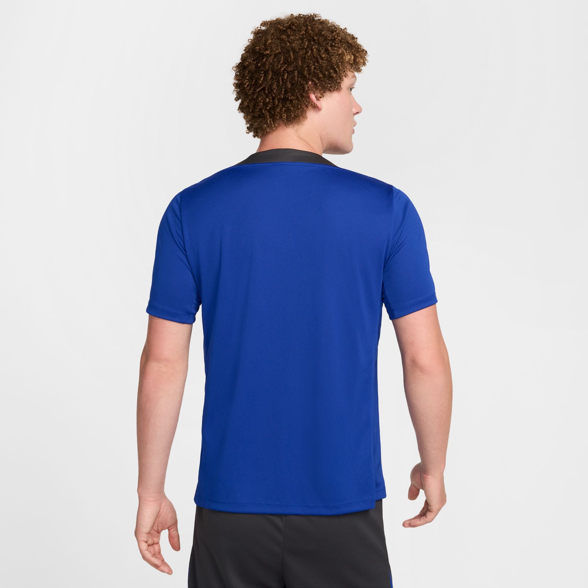 Camiseta de entrenamiento de fútbol Nike Dri-FIT de corte recto Barcelona Strike 23/24